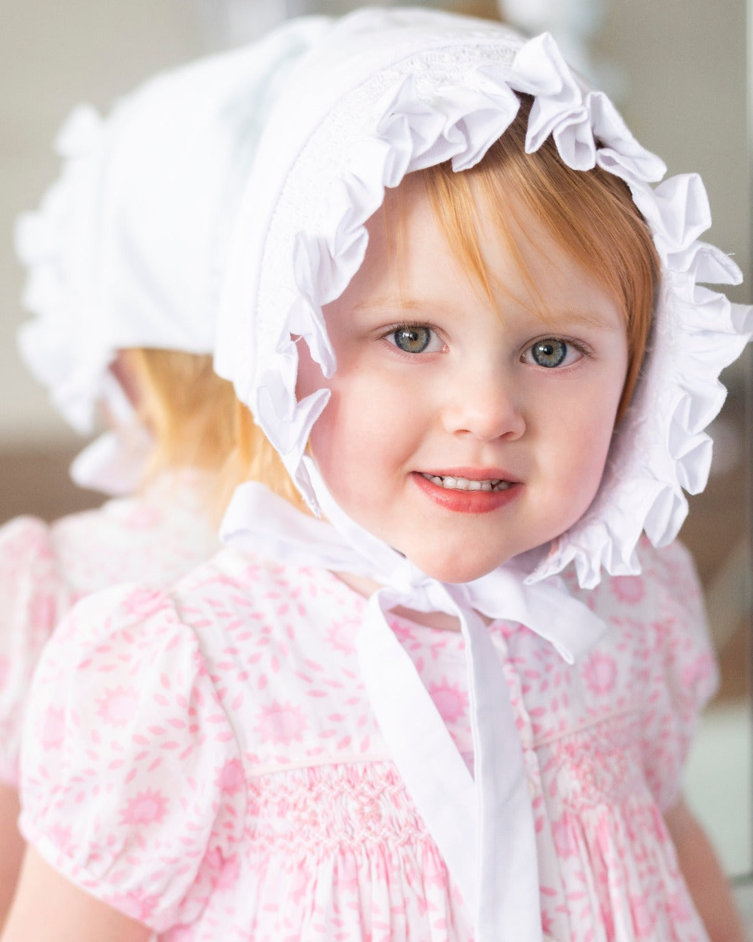 Smocked White Bonnet